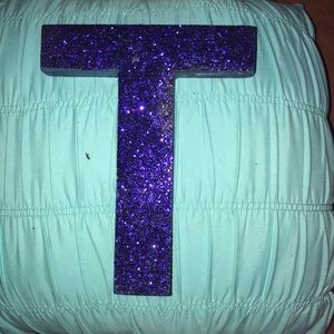 Painted letter “T”